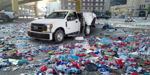 street sweeper cleaning up after an event